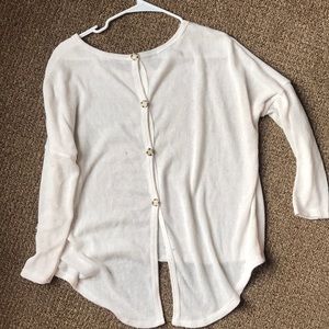 Cream sweater with button down back